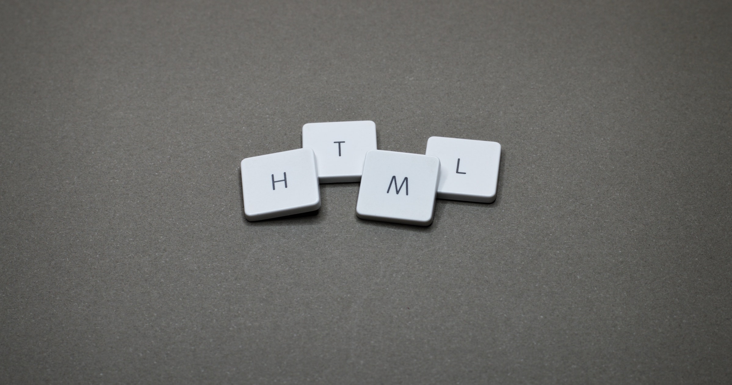 HTML letters - Photo by Miguel A. Padrinan from Pexels 